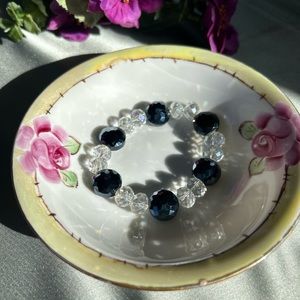 Handcrafted beaded stretchy bracelet with clear & black crystal cut bead…